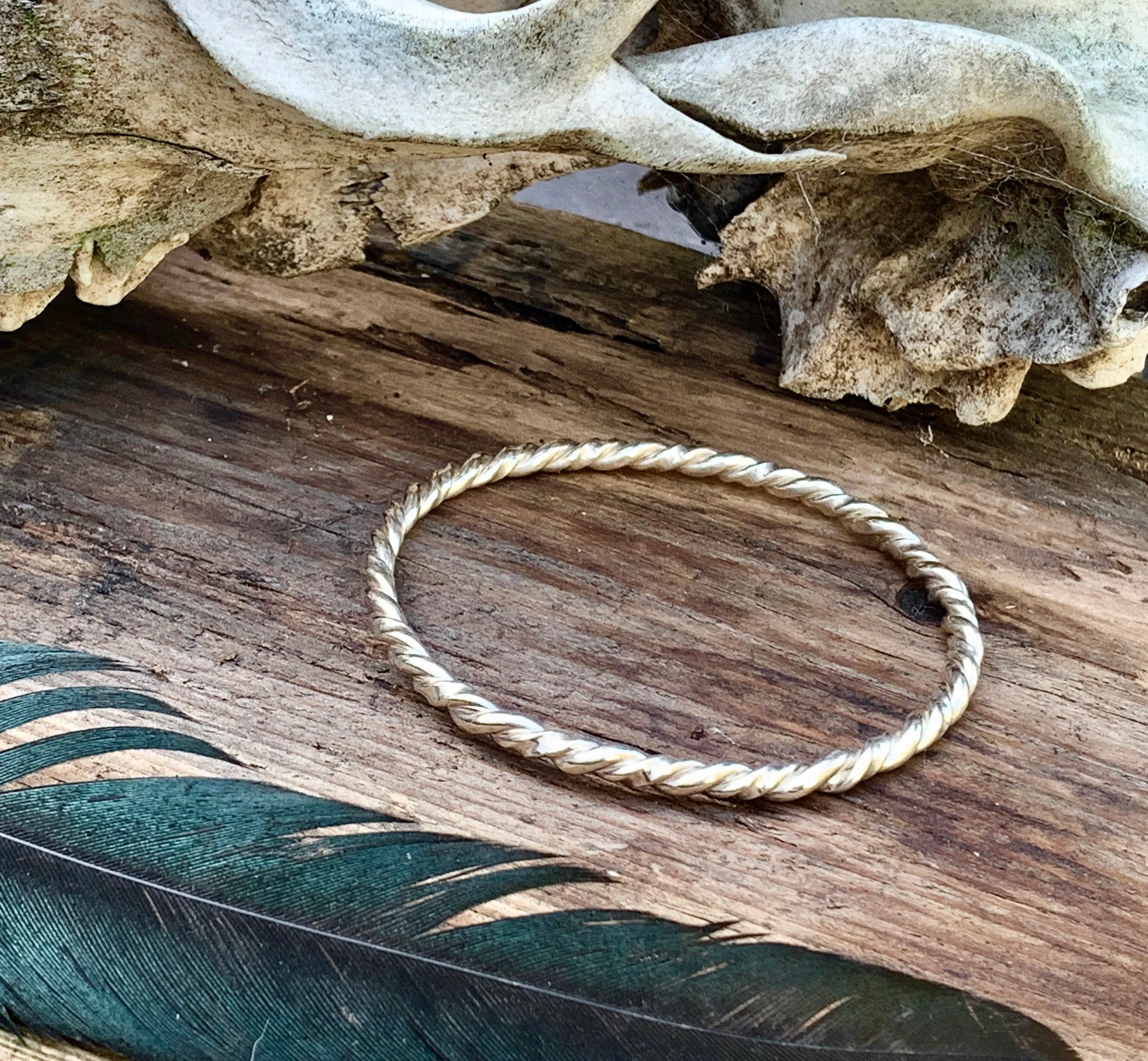 Sterling silver twisted bangle. M/L