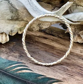 Sterling silver twisted bangle. M/L